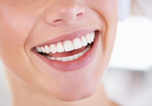 A Brilliant Display Of Pearly Whites. Close Up Of A Womans Spark
